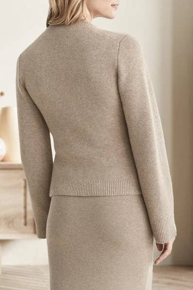 Demure hourglass silhouette cardigan