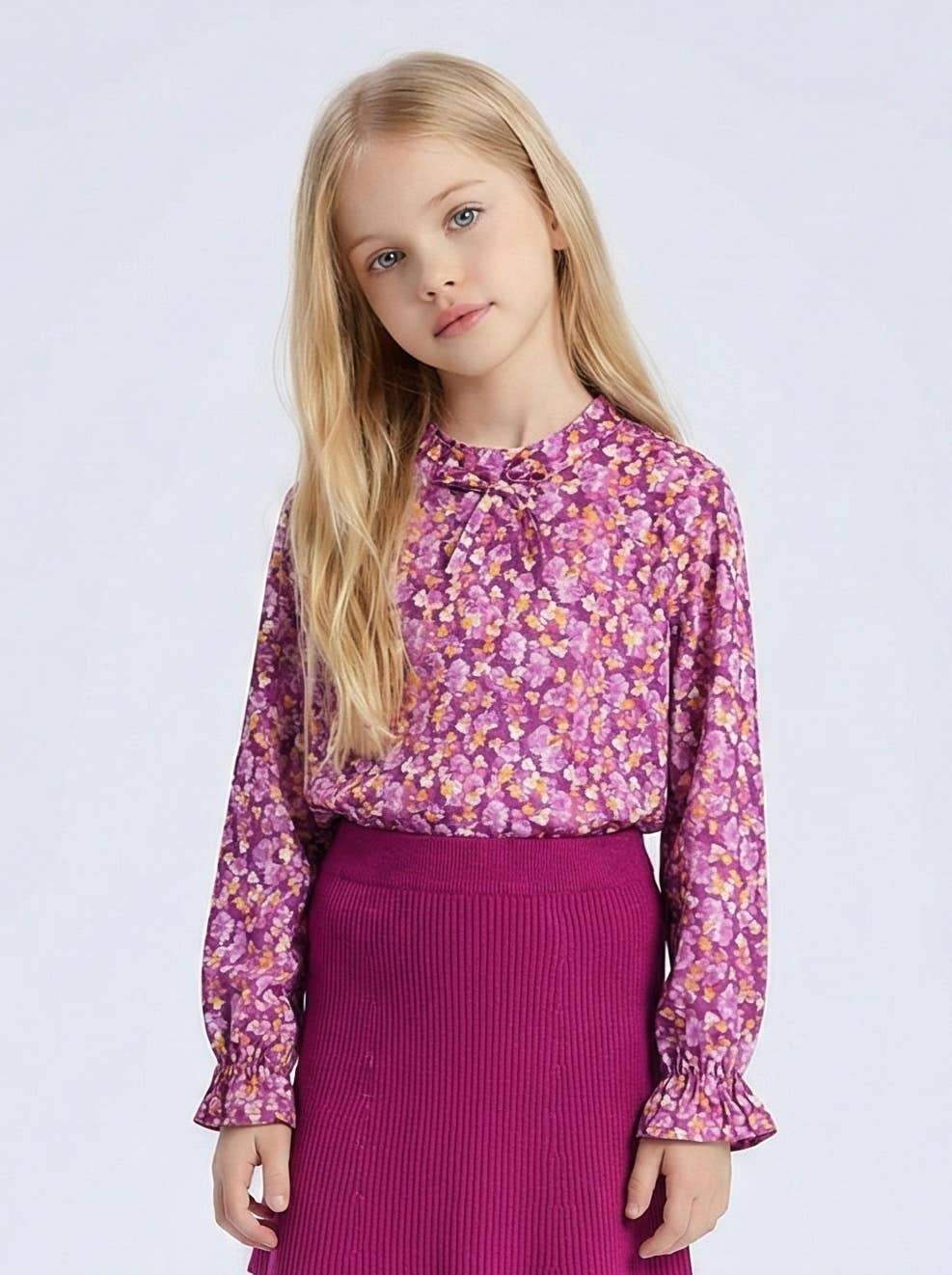 Floral top with small bow and ruffle for girl