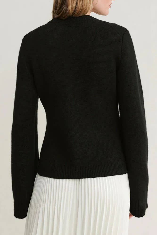 Demure hourglass silhouette cardigan